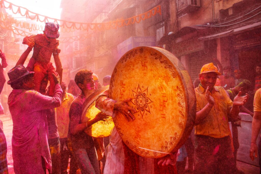 Joyful Holi celebration in Kolkata with colors, music, and festivities.